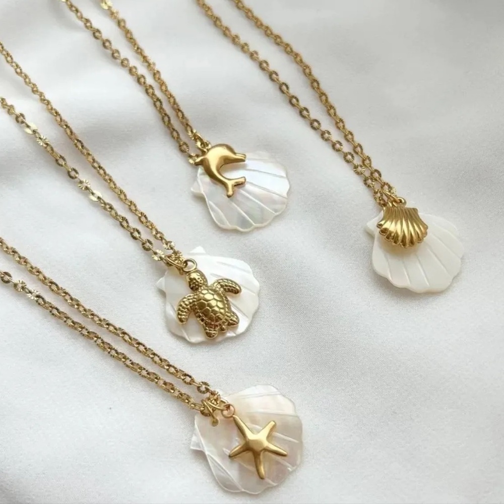 Gold and White Shell Pendant Necklaces